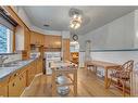 5620 50 Avenue, Innisfail, AB  - Indoor Photo Showing Kitchen With Double Sink 