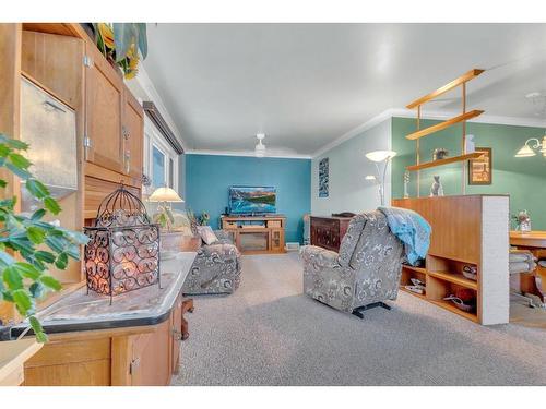 5620 50 Avenue, Innisfail, AB - Indoor Photo Showing Living Room