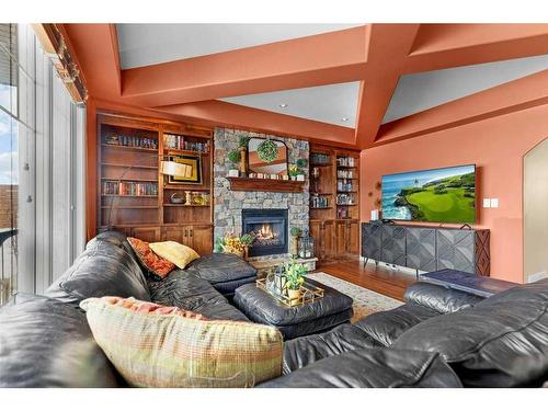 4006 45 Avenue, Sylvan Lake, AB - Indoor Photo Showing Living Room With Fireplace