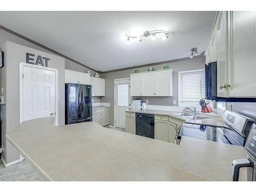 127 Kirkland Close, Red Deer, AB - Indoor Photo Showing Kitchen