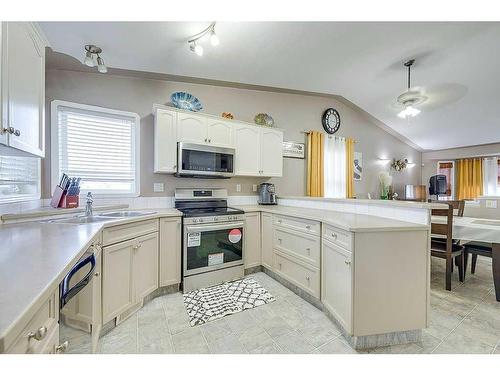 127 Kirkland Close, Red Deer, AB - Indoor Photo Showing Kitchen With Double Sink