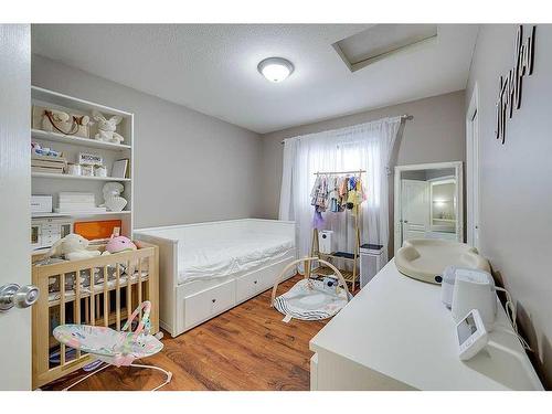 127 Kirkland Close, Red Deer, AB - Indoor Photo Showing Bedroom