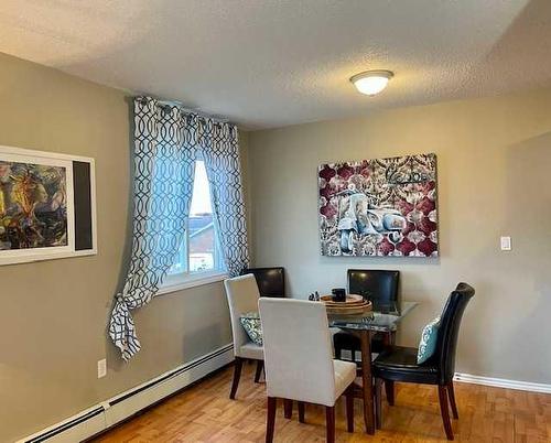 305-4904 54 Street, Red Deer, AB - Indoor Photo Showing Dining Room