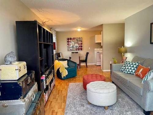 305-4904 54 Street, Red Deer, AB - Indoor Photo Showing Living Room