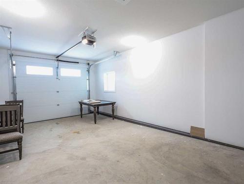 4509 B 56A Street Close, Stettler, AB - Indoor Photo Showing Garage