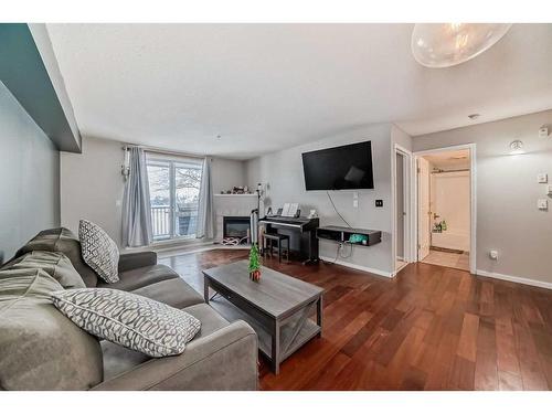 114-60 Lawford Avenue, Red Deer, AB - Indoor Photo Showing Living Room With Fireplace