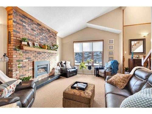 422035 Highway 2A, Rural Ponoka County, AB - Indoor Photo Showing Living Room With Fireplace