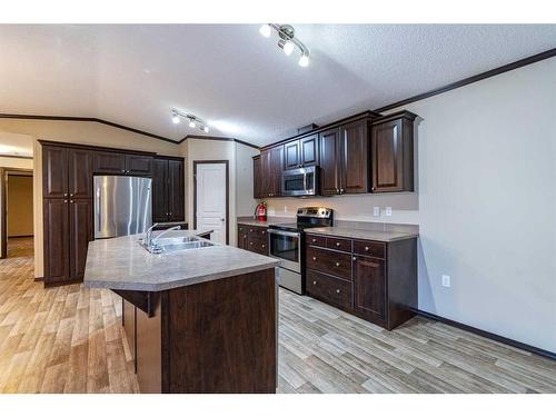 4919 43 Street, Stettler, AB - Indoor Photo Showing Kitchen With Stainless Steel Kitchen With Double Sink