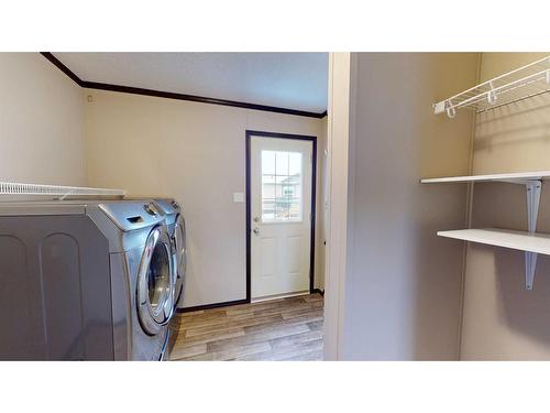 4919 43 Street, Stettler, AB - Indoor Photo Showing Laundry Room