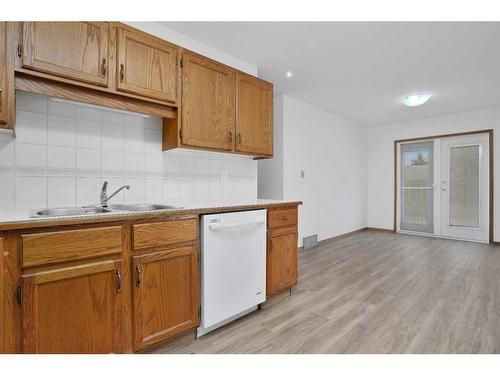 12 Dixon Crescent, Red Deer, AB - Indoor Photo Showing Kitchen With Double Sink