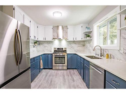 5144 52 Street, Caroline, AB - Indoor Photo Showing Kitchen With Double Sink With Upgraded Kitchen