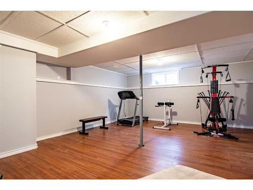 5144 52 Street, Caroline, AB - Indoor Photo Showing Gym Room