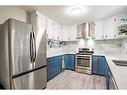 5144 52 Street, Caroline, AB  - Indoor Photo Showing Kitchen With Double Sink With Upgraded Kitchen 