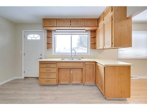 4013 47 Street, Red Deer, AB - Indoor Photo Showing Kitchen With Double Sink