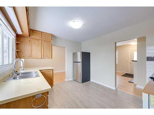 4013 47 Street, Red Deer, AB - Indoor Photo Showing Kitchen With Double Sink