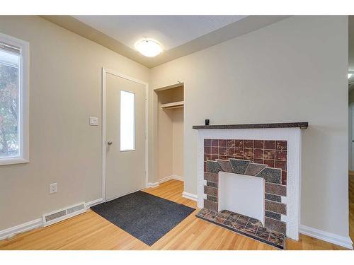 4013 47 Street, Red Deer, AB - Indoor Photo Showing Other Room With Fireplace