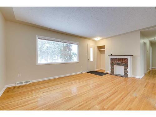 4013 47 Street, Red Deer, AB - Indoor With Fireplace