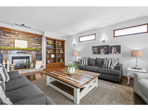 21-40419 Range Road 10, Rural Lacombe County, AB - Indoor Photo Showing Living Room With Fireplace