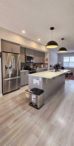 386 Hillcrest Road Sw, Airdrie, AB - Indoor Photo Showing Kitchen