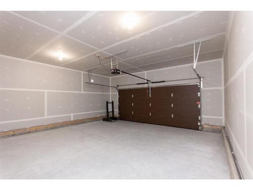 44 Toal Close, Red Deer, AB - Indoor Photo Showing Garage