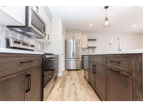 44 Toal Close, Red Deer, AB - Indoor Photo Showing Kitchen With Stainless Steel Kitchen With Upgraded Kitchen