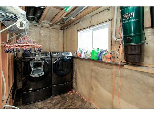 126 Sunridge Avenue, Blackfalds, AB - Indoor Photo Showing Laundry Room