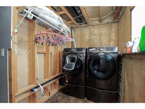 126 Sunridge Avenue, Blackfalds, AB - Indoor Photo Showing Laundry Room