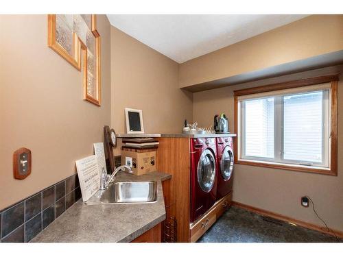 5104 55 Street Close, Eckville, AB - Indoor Photo Showing Laundry Room