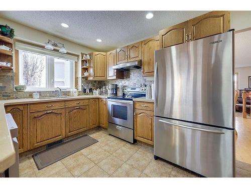 25 Rose Crescent, Red Deer, AB - Indoor Photo Showing Kitchen With Stainless Steel Kitchen With Double Sink