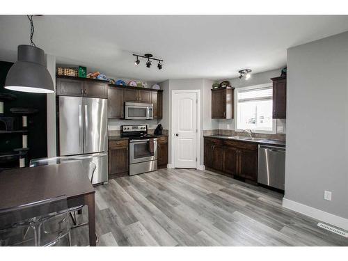 11 Fawn Meadows Drive, Delburne, AB - Indoor Photo Showing Kitchen With Double Sink