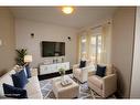 13 Ralston Place, Sylvan Lake, AB  - Indoor Photo Showing Living Room 