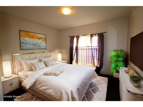 13 Ralston Place, Sylvan Lake, AB - Indoor Photo Showing Bedroom