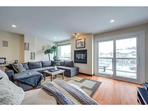 5225 Westridge Drive, Blackfalds, AB - Indoor Photo Showing Living Room With Fireplace