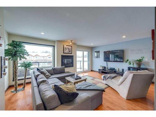 5225 Westridge Drive, Blackfalds, AB - Indoor Photo Showing Living Room With Fireplace