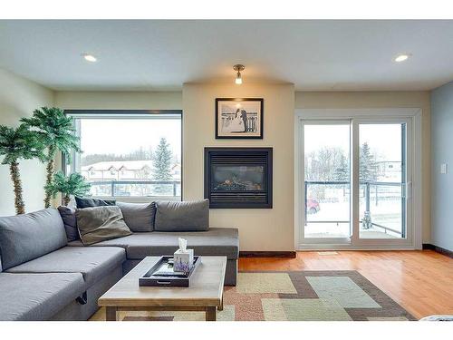 5225 Westridge Drive, Blackfalds, AB - Indoor Photo Showing Living Room With Fireplace