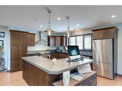 5225 Westridge Drive, Blackfalds, AB - Indoor Photo Showing Kitchen With Stainless Steel Kitchen With Double Sink With Upgraded Kitchen