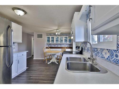 4820 55 Avenue, Camrose, AB - Indoor Photo Showing Kitchen With Double Sink