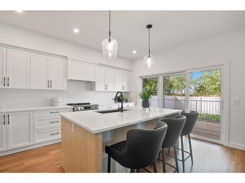 135 Ellington Crescent, Red Deer, AB - Indoor Photo Showing Kitchen With Upgraded Kitchen