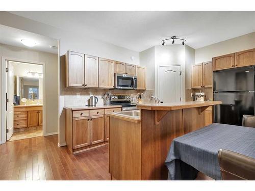 C4-99 Pioneer Way, Blackfalds, AB - Indoor Photo Showing Kitchen