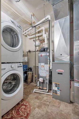 C4-99 Pioneer Way, Blackfalds, AB - Indoor Photo Showing Laundry Room