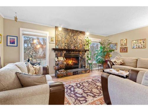 59 Gish Street, Red Deer, AB - Indoor Photo Showing Living Room With Fireplace