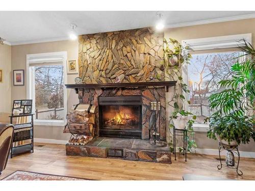 59 Gish Street, Red Deer, AB - Indoor Photo Showing Living Room With Fireplace