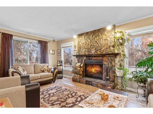 59 Gish Street, Red Deer, AB - Indoor Photo Showing Living Room With Fireplace