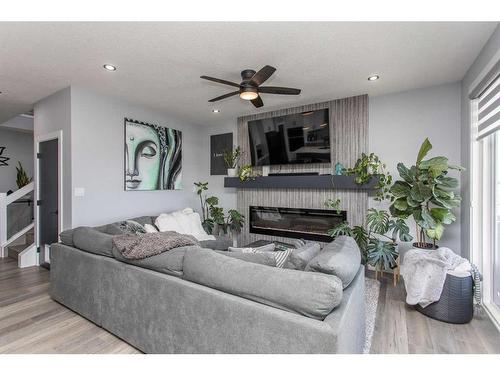 4175 Ryders Ridge Boulevard, Sylvan Lake, AB - Indoor Photo Showing Living Room With Fireplace