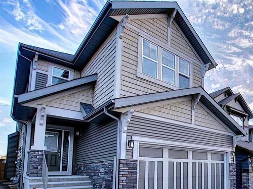 238 Kingfisher Crescent Se, Airdrie, AB - Outdoor With Facade