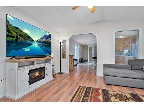 91 Northland Drive, Rural Clearwater County, AB - Indoor Photo Showing Living Room With Fireplace