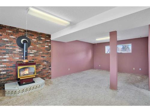 5836 58 Street, Rocky Mountain House, AB - Indoor With Fireplace