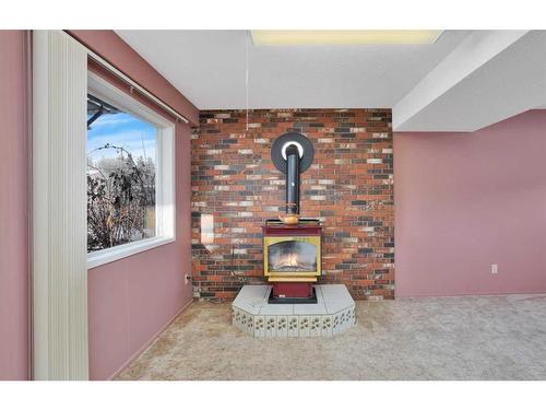 5836 58 Street, Rocky Mountain House, AB - Indoor With Fireplace