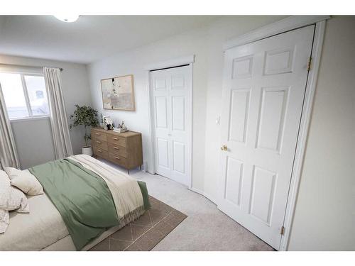 22 Willow Springs Crescent, Sylvan Lake, AB - Indoor Photo Showing Bedroom