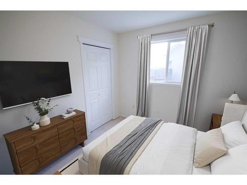 22 Willow Springs Crescent, Sylvan Lake, AB - Indoor Photo Showing Bedroom